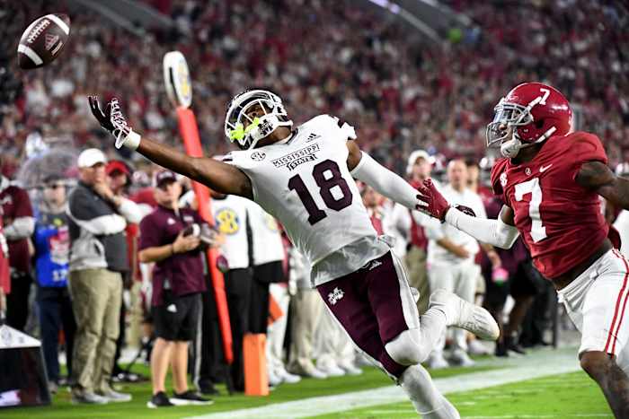 Mississippi State Bulldogs wide receiver Justin Robinson (18) cannot catch a pass in the end zone against Alabama Crimson Tide defensive back Eli Ricks (7) during the first half at Bryant-Denny Stadium.